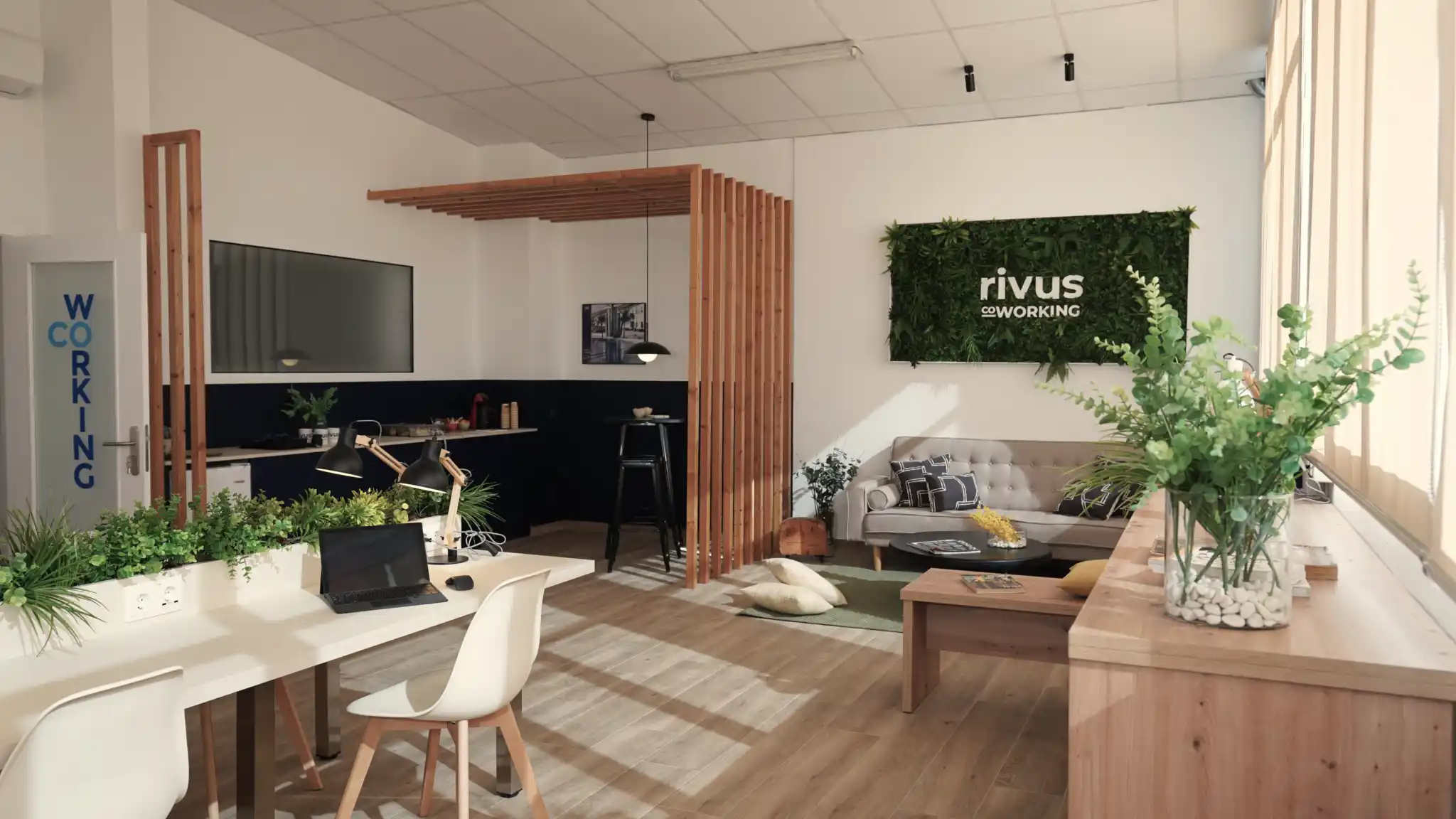 Vista general del espacio de trabajo en el Coworking Rivus, con mesas, sillas y decoración moderna.